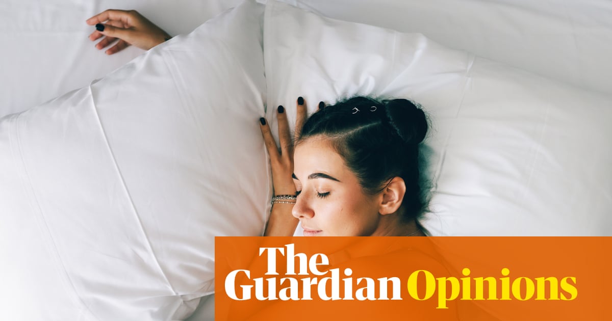 young woman sleeping in bed