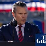Pete Hegseth speaks at a presidential lectern outdoors during an event