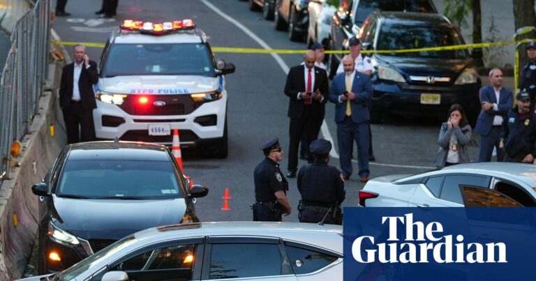 Cars and people at scene of shooting