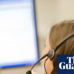 A woman in a call centre using a phone headset