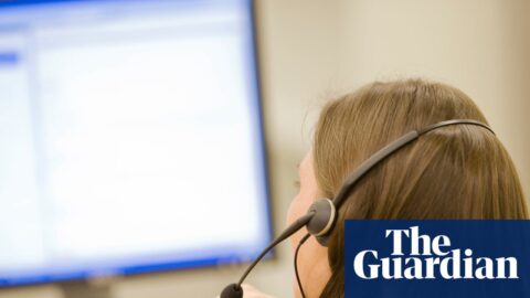 A woman in a call centre using a phone headset