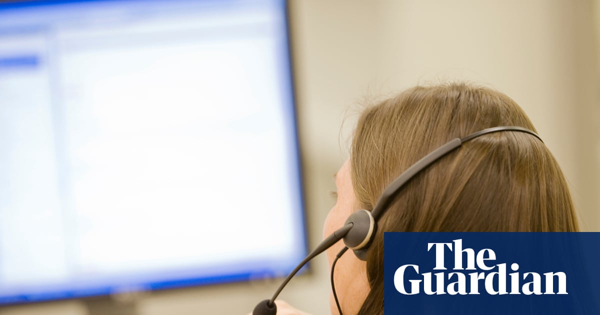A woman in a call centre using a phone headset