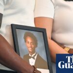 People hold picture of teenager